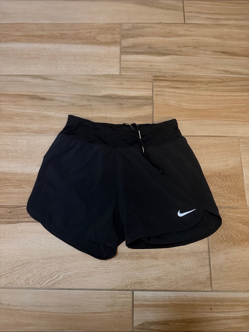 Nike Women’s Black Athletic Shorts with White Swoosh